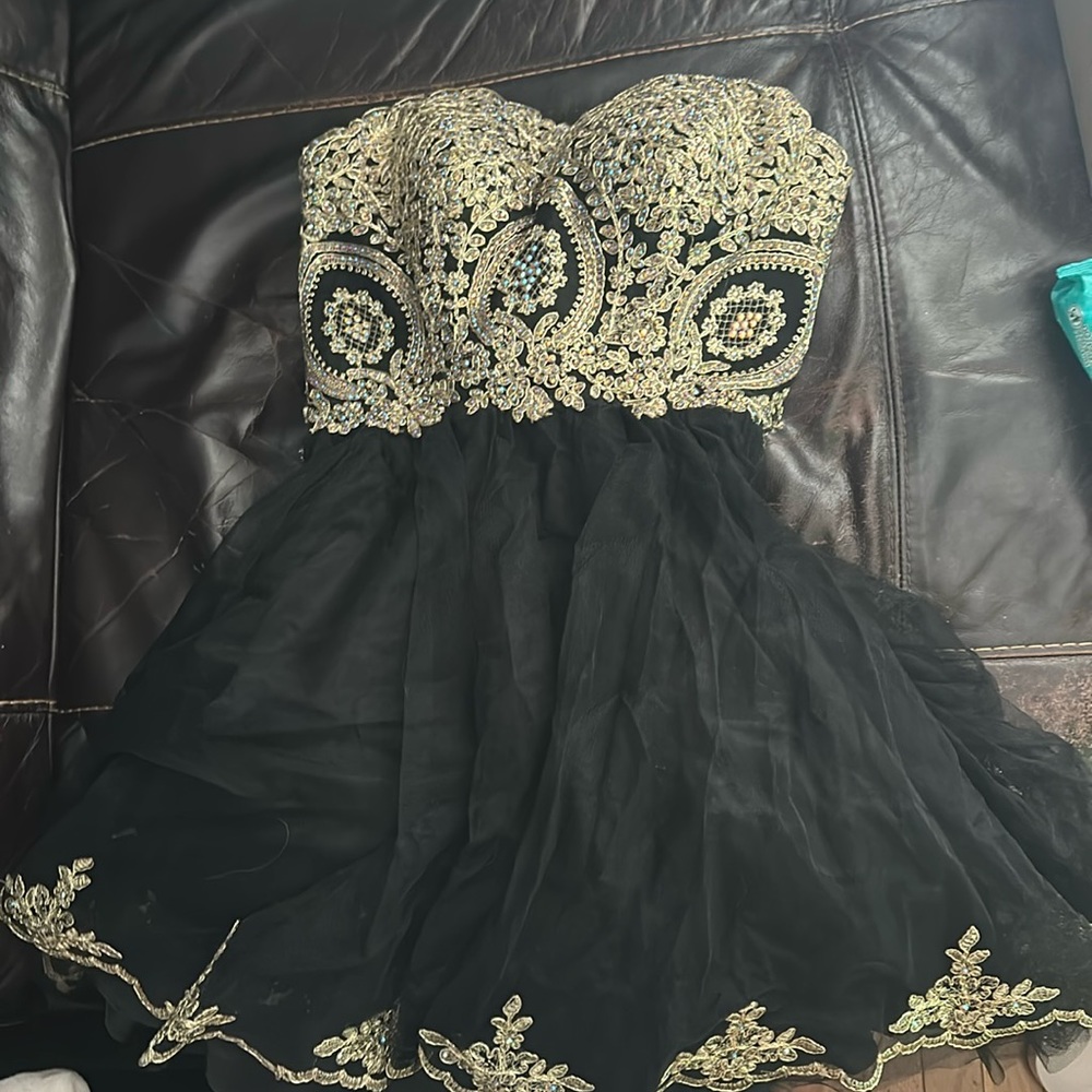 Women’s black n gold party dress